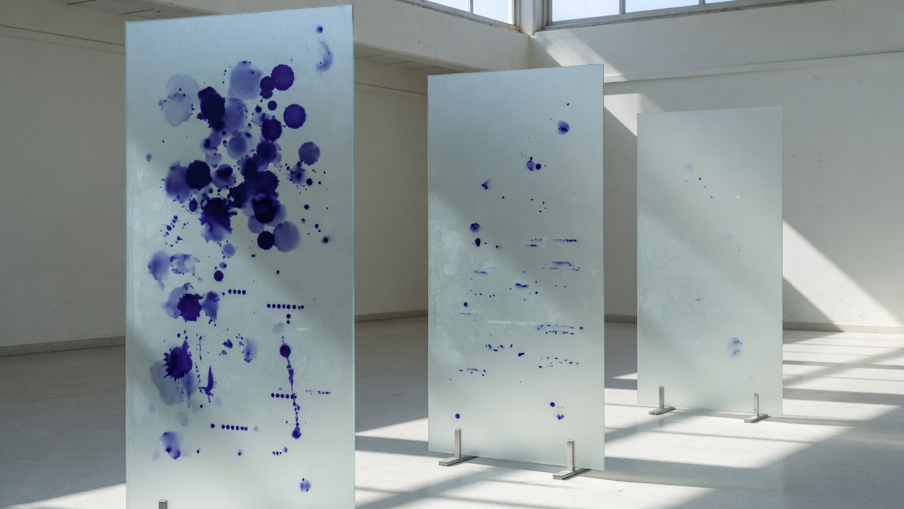 Three frosted glass panels with increasing signal clarity